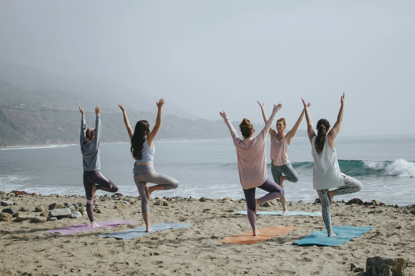 background yoga on beach connected